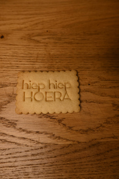 koekjesvorm met tekst